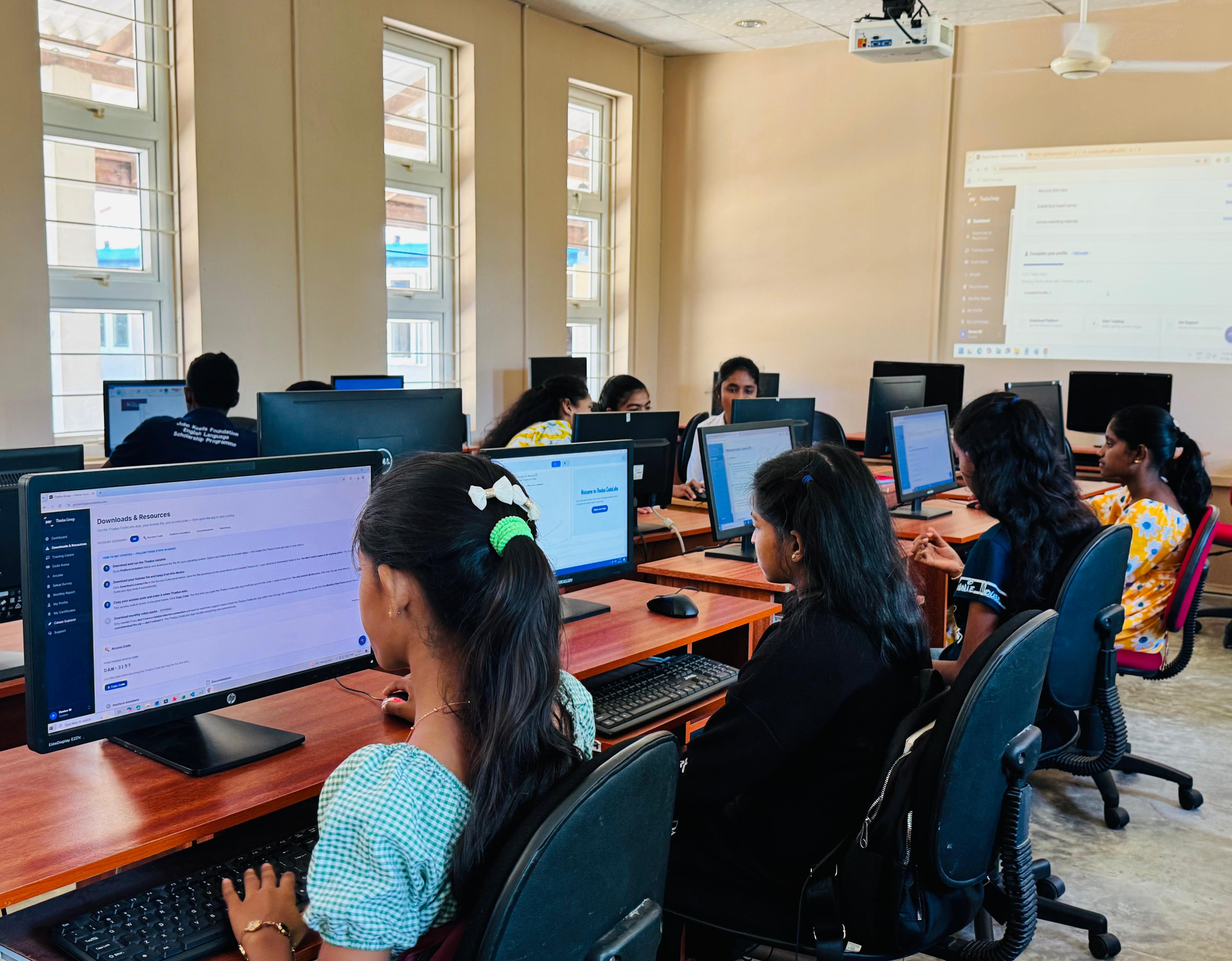 Students working at computers at a Thadus CodeLabs centre in Delft Island, Sri Lanka